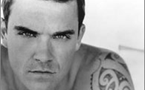 robbie escapes fine for mooning in singapore
